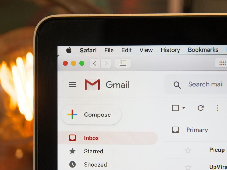 A laptop displaying emails on Gmail.